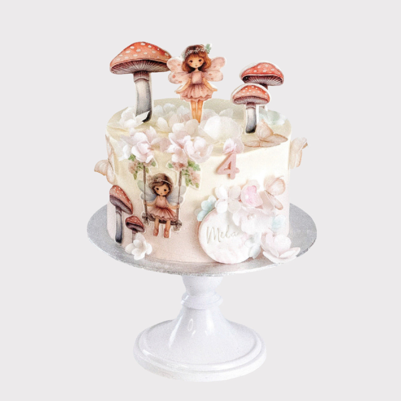 Sprookjestuin kindertaart met elfjes en bloemen