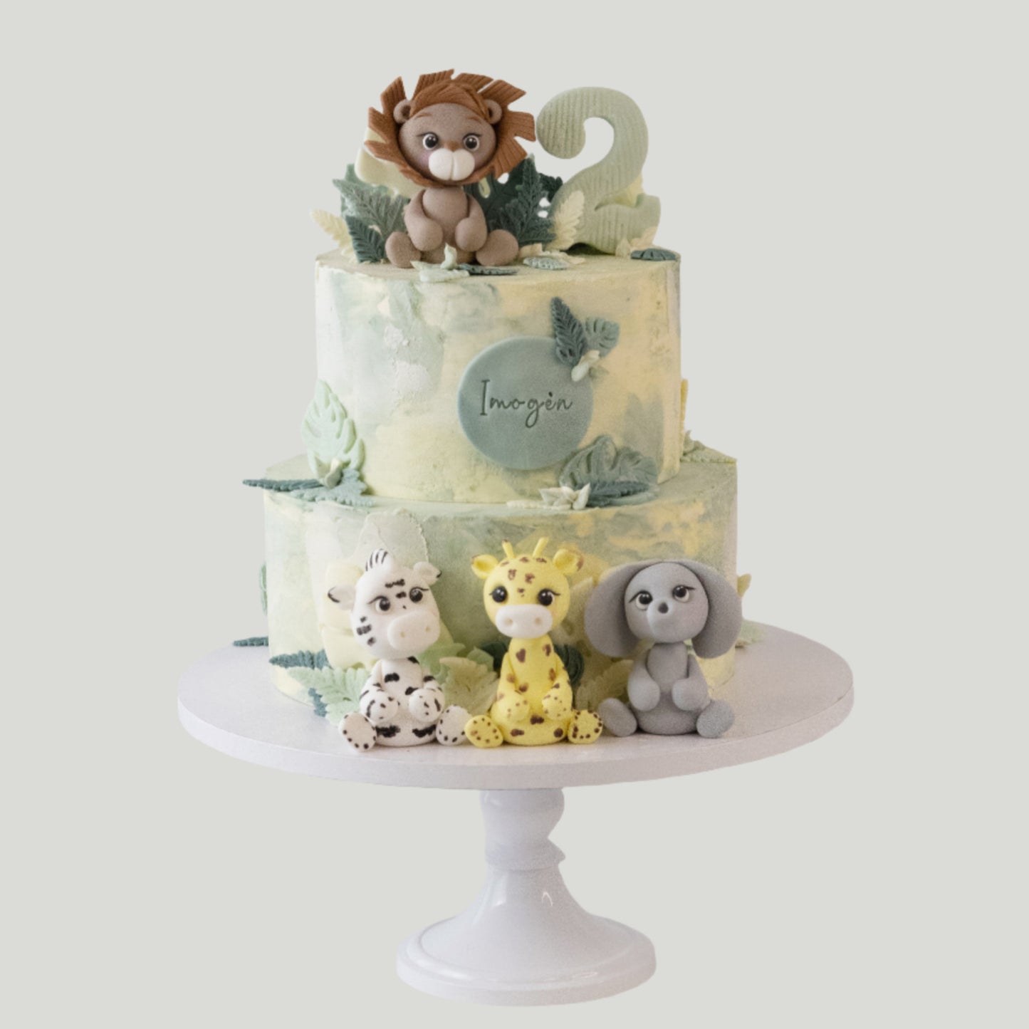 Gepersonaliseerde jungle safari taart met keuze uit verschillende fondant dieren